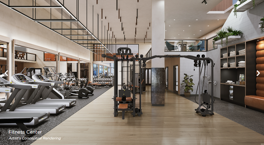 State-of-the-art fitness center — cardio equipment, free weights, floor-to-ceiling windows